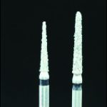 Figure 10-48. Flame-shaped or round-ended slender tapered burs can be used for preparing the incisal rest seat.